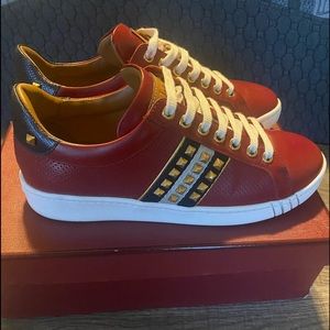 Women Bally lace up studded sneaker.